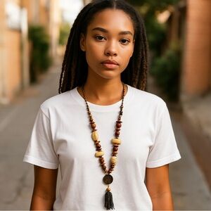 adia kibur necklace wood , shells , beads signed